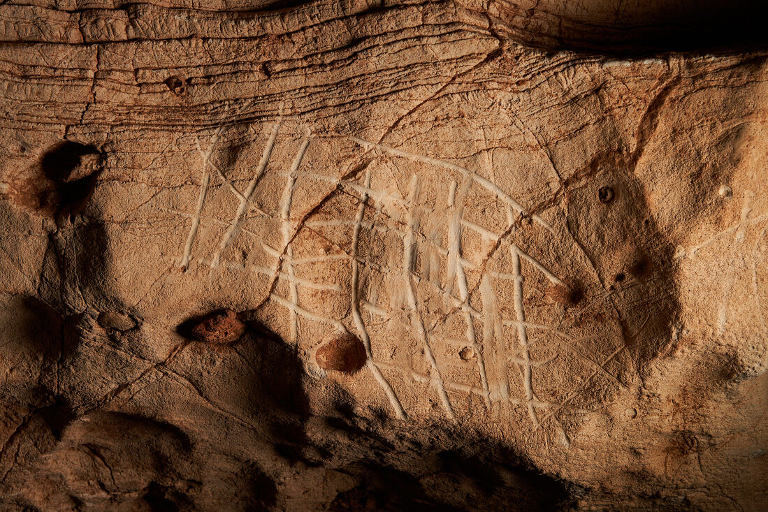 Prehistoric engravings 'Cova de la Vila” cave discovered in Tarragona (La Febró, Catalonia, Spain)